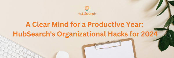 A clean and organized workspace with a neatly color-coded calendar, a clutter-free desk, and digital folders.